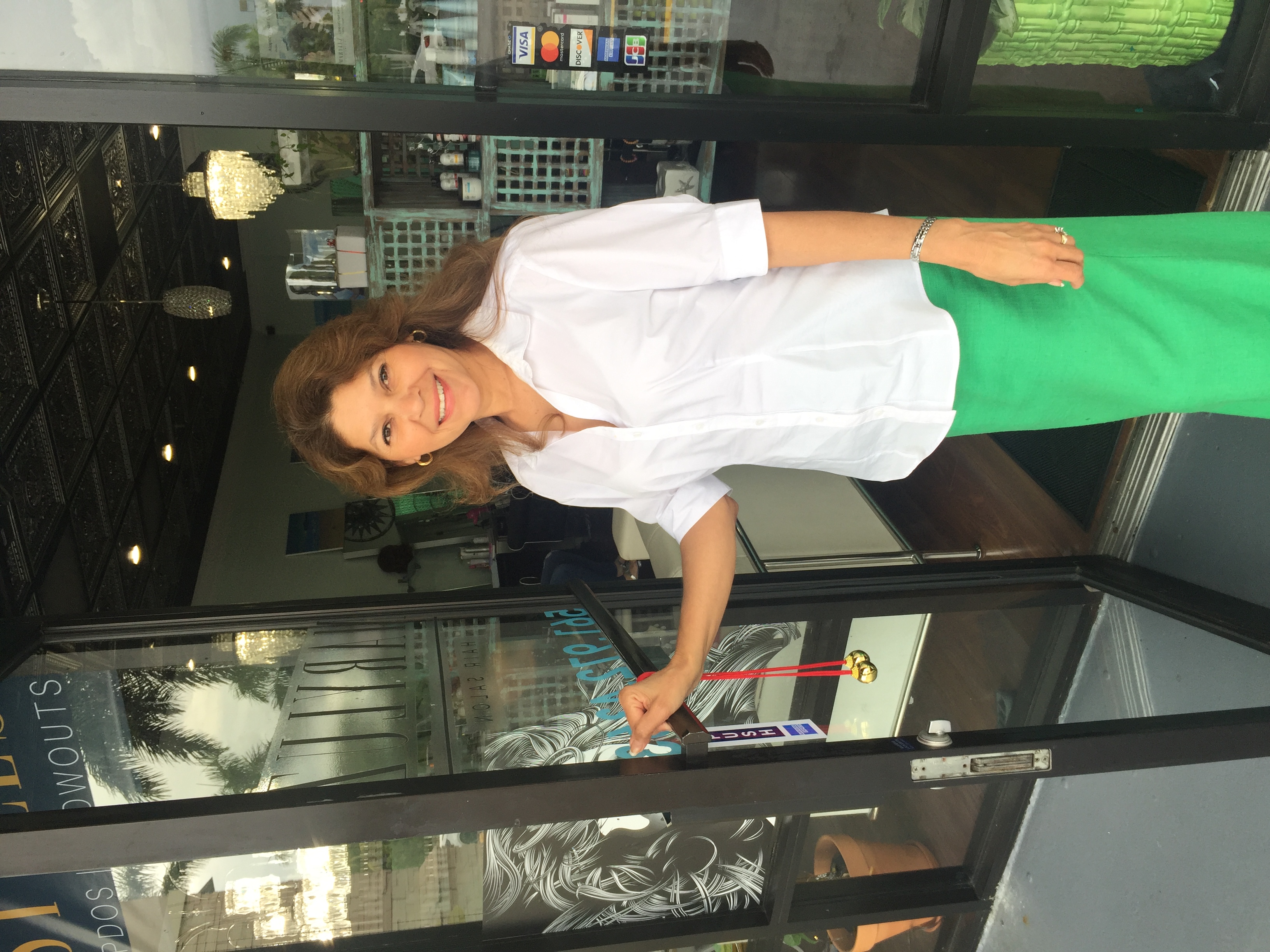 MaryLuz, owner and stylist, in her welcoming salon space