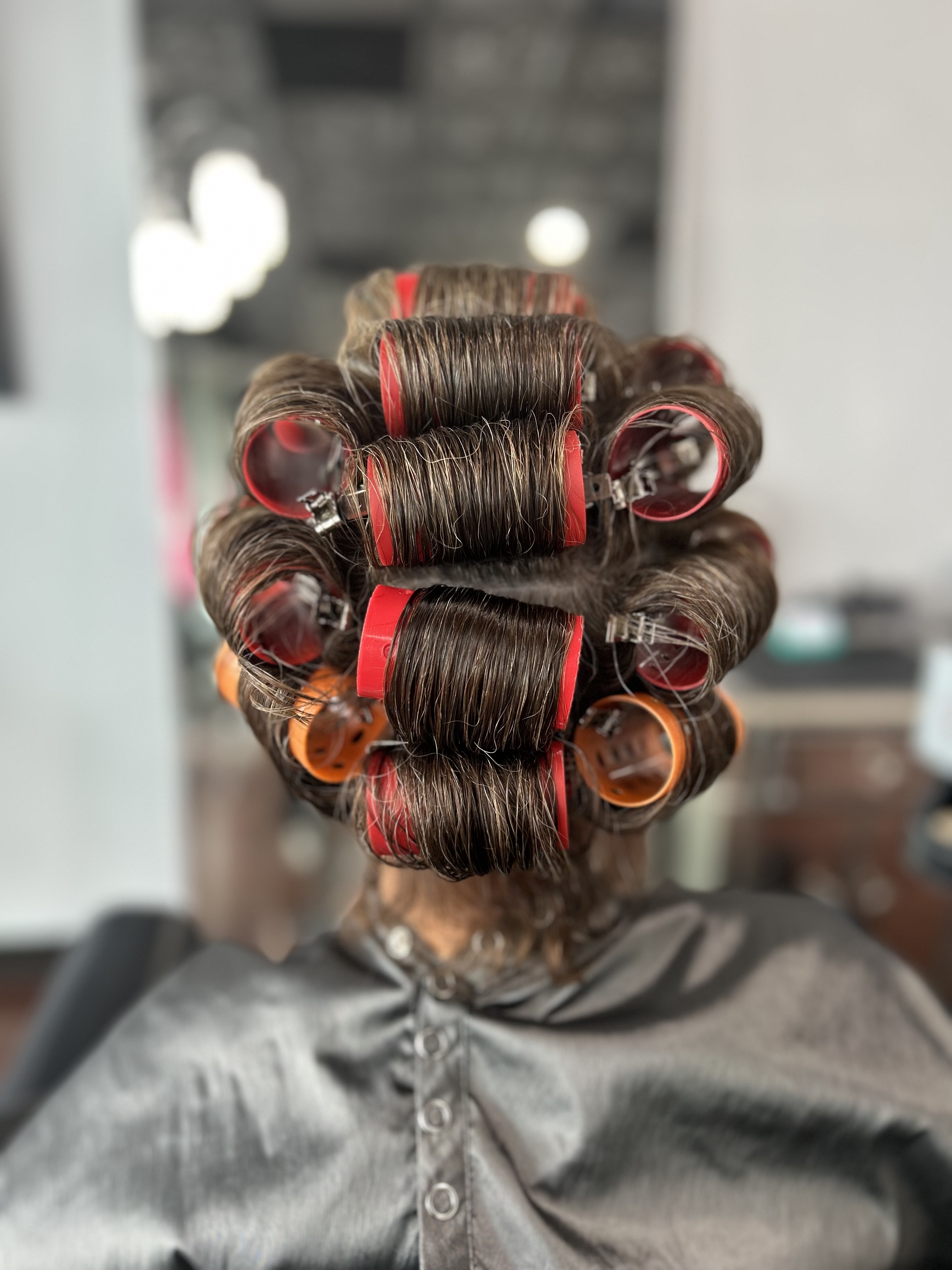 Curly hair styling result showing MaryLuz Hair Salon's adaptability to all hair textures